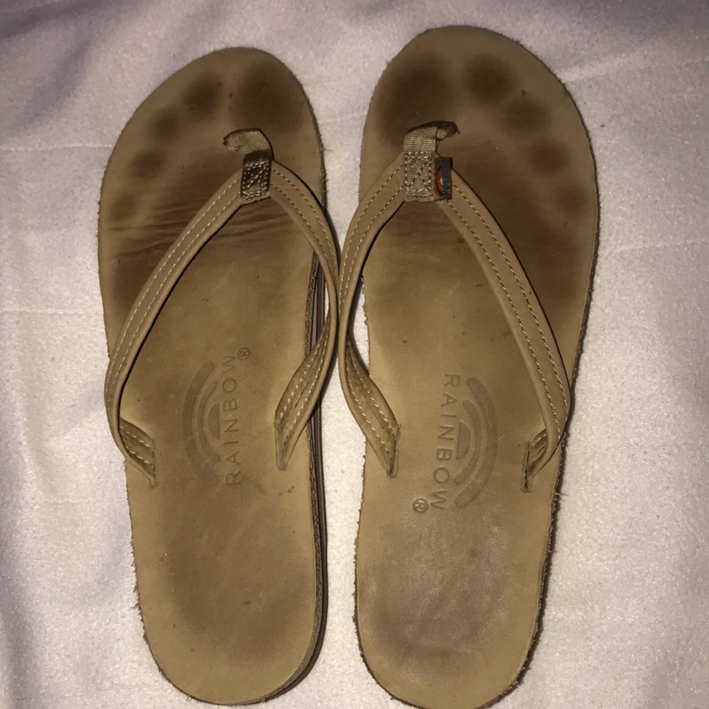 light brown rainbows flip flops